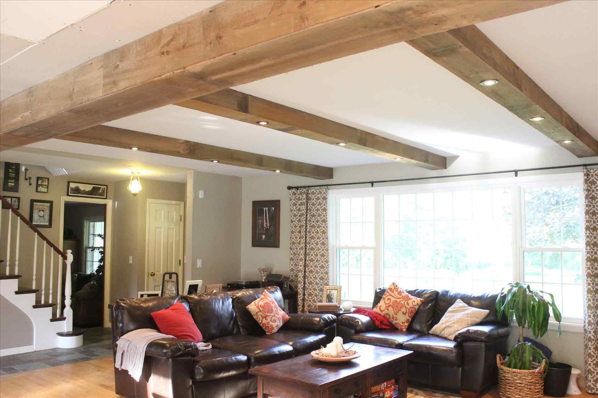 Натяжной потолок в деревянном доме (39 фото): плюсы и минусы потолочных покрытий в доме с балками, отзывы владельцев